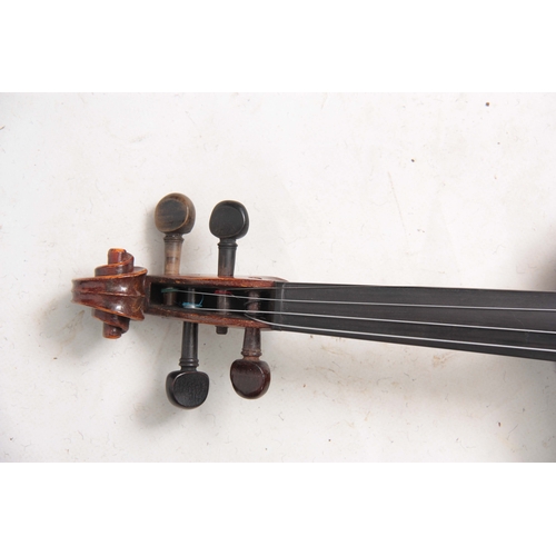 767 - AN ANTIQUE VIOLIN length of back 36cm - sold in a viola case with a bow.