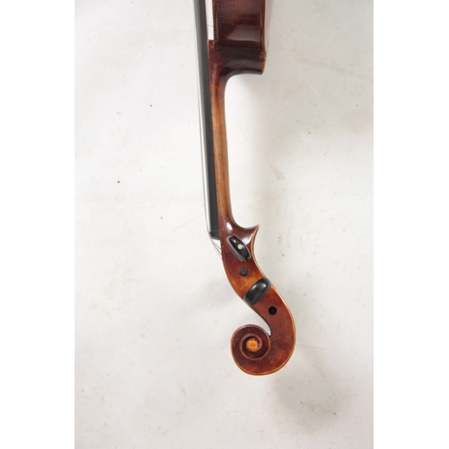 767 - AN ANTIQUE VIOLIN length of back 36cm - sold in a viola case with a bow.