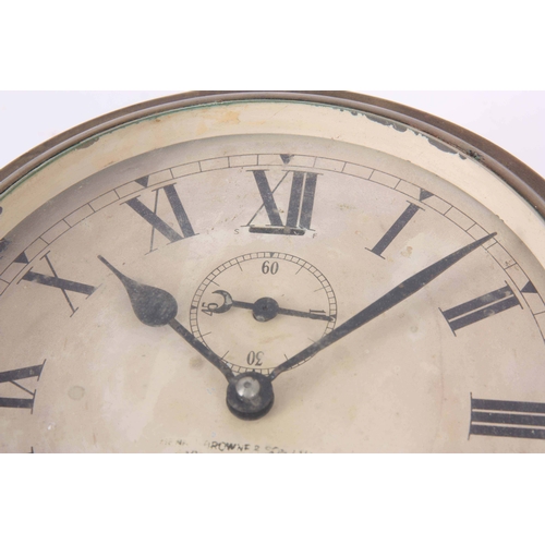 1089 - AN EARLY 20th CENTURY BRASS CASED SHIPS CLOCK with Roman dial fronting an eight-day spring driven mo... 