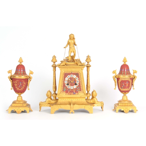 1091 - A LATE 19th CENTURY FRENCH EGYPTIAN STYLE ORMOLU AND PORCELAIN CLOCK GARNITURE the case surmounted b... 