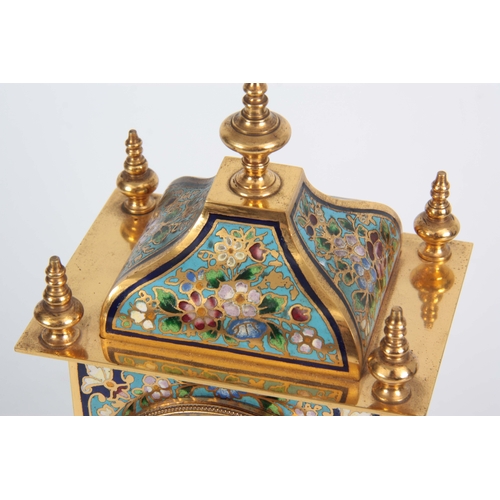 1094 - A LATE 19TH CENTURY FRENCH GILT BRASS AND CHAMPLEVE ENAMEL MANTEL CLOCK with moulded edge stepped ba... 