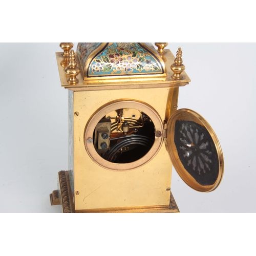 1094 - A LATE 19TH CENTURY FRENCH GILT BRASS AND CHAMPLEVE ENAMEL MANTEL CLOCK with moulded edge stepped ba... 