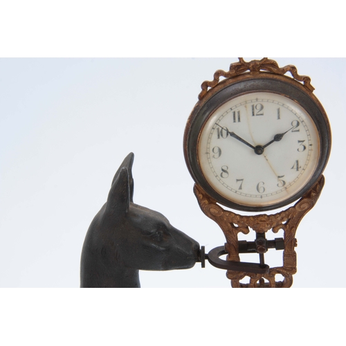 1102 - AN EARLY 20th CENTURY PATINATED METAL KANGAROO MYSTERY MANTEL CLOCK the kangaroo standing on natural... 