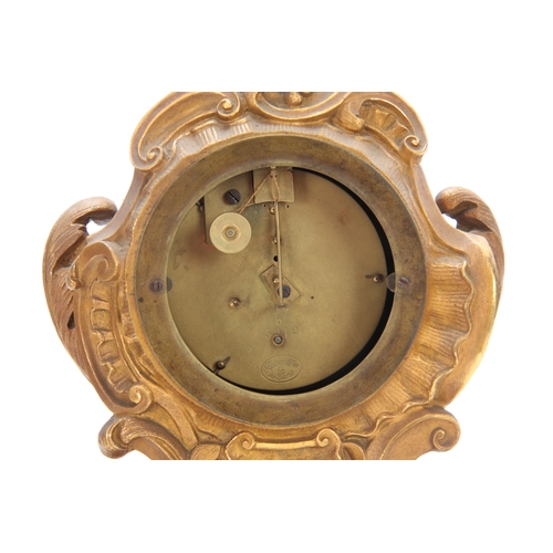 1105 - RAINGO FRERES a PARIS. A MID 19th CENTURY FRENCH ORMOLU MANTEL CLOCK the rococo style case with scro... 