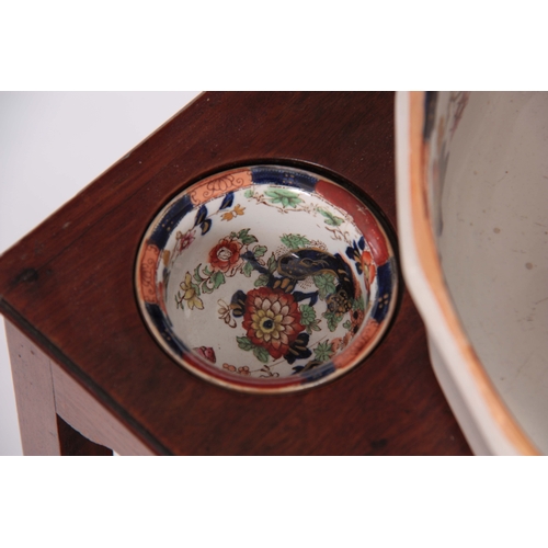 1116 - A GEORGIAN SQUARE MAHOGANY WASHSTAND FITTED WITH AN IRONSTONE WASH SET, decorated with floral transf... 