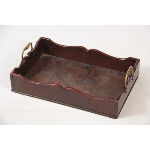 1121 - A GEORGE III MAHOGANY LIBRARY TRAY with shaped raised sides and fitted brass carrying handles 51cm 3... 