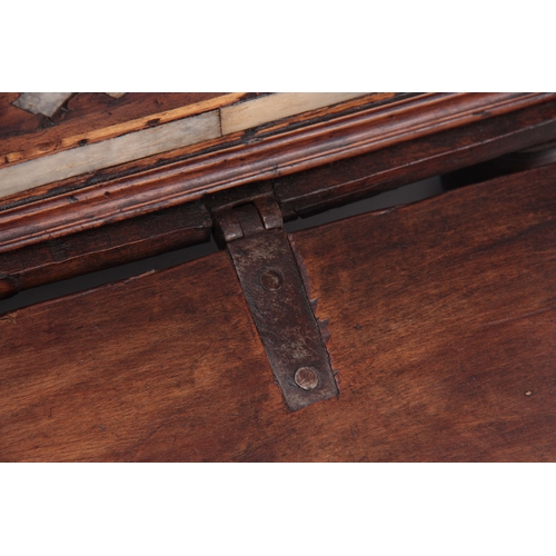 1126 - AN EARLY EASTERN EUROPEAN FRUITWOOD TABLE CASKET with ironwork straps and lock plate, the hinged dow... 