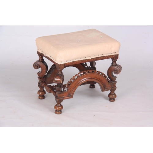 1131 - A LATE 17TH CENTURY WALNUT STOOL with square scroll shaped 'Horse Bone' cabriole leg supports joined... 