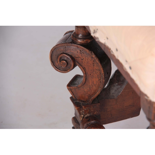 1131 - A LATE 17TH CENTURY WALNUT STOOL with square scroll shaped 'Horse Bone' cabriole leg supports joined... 