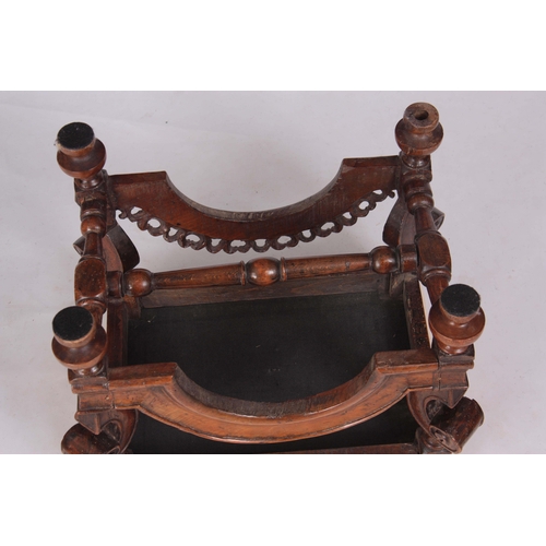 1131 - A LATE 17TH CENTURY WALNUT STOOL with square scroll shaped 'Horse Bone' cabriole leg supports joined... 