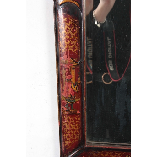 1139 - A 20TH CENTURY CHINOISERIE SCARLET LACQUERED HANGING MIRROR with shaped top depicting figures in a g... 