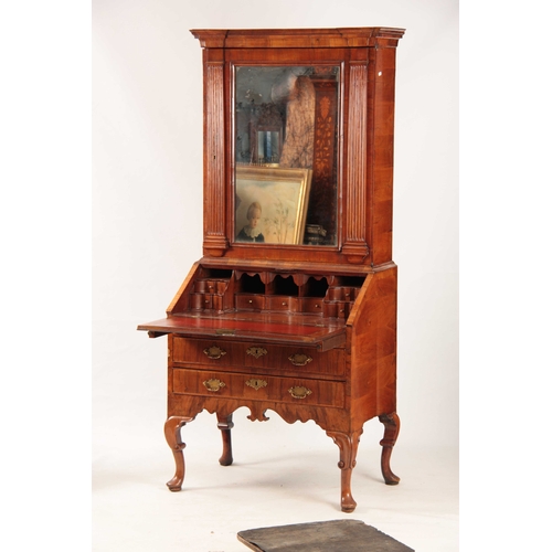 1144 - AN UNUSUAL QUEEN ANNE FIGURED WALNUT BUREAU BOOKCASE the mirrored top upper part flanked by tapering... 