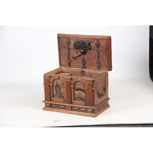 1146 - AN EARLY 17TH CENTURY CONTINENTAL WALNUT STONG BOX / CASKET the panelled top fitted with an elaborat... 