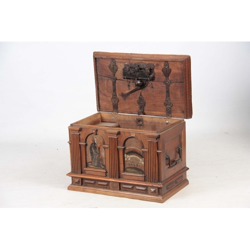 1146 - AN EARLY 17TH CENTURY CONTINENTAL WALNUT STONG BOX / CASKET the panelled top fitted with an elaborat... 