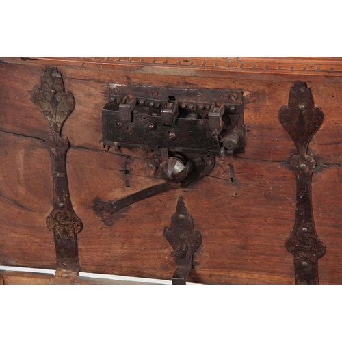 1146 - AN EARLY 17TH CENTURY CONTINENTAL WALNUT STONG BOX / CASKET the panelled top fitted with an elaborat... 