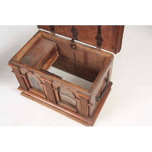 1146 - AN EARLY 17TH CENTURY CONTINENTAL WALNUT STONG BOX / CASKET the panelled top fitted with an elaborat... 