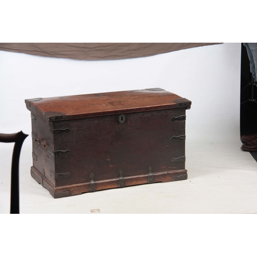 1151 - AN 18TH CENTURY WALNUT OFFICERS TRUNK with iron mounted corners and strapped sides with carrying han... 