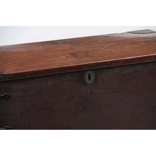 1151 - AN 18TH CENTURY WALNUT OFFICERS TRUNK with iron mounted corners and strapped sides with carrying han... 