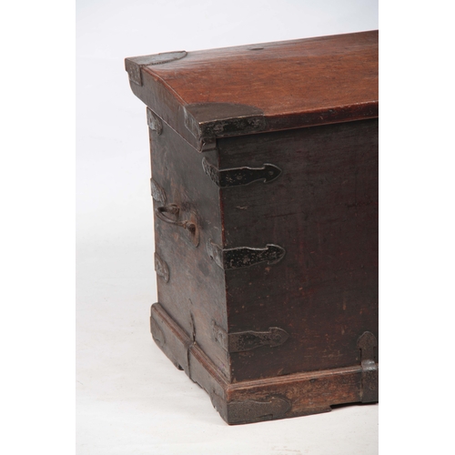 1151 - AN 18TH CENTURY WALNUT OFFICERS TRUNK with iron mounted corners and strapped sides with carrying han... 