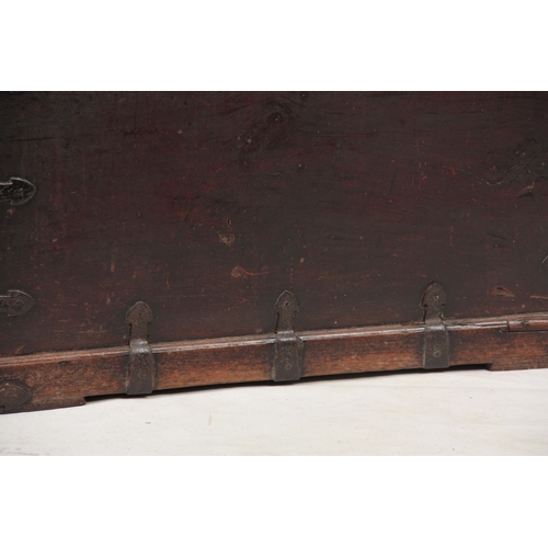 1151 - AN 18TH CENTURY WALNUT OFFICERS TRUNK with iron mounted corners and strapped sides with carrying han... 