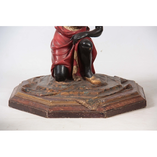 1153 - A LATE 19TH CENTURY BLACKAMOOR DEMI LUNE SIDE TABLE with mirrored top above a figural polychrome pai... 