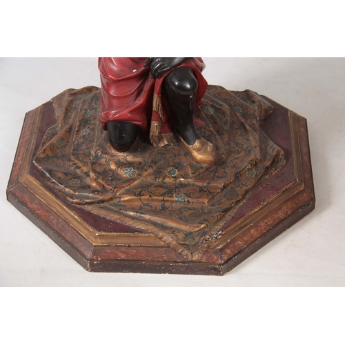 1153 - A LATE 19TH CENTURY BLACKAMOOR DEMI LUNE SIDE TABLE with mirrored top above a figural polychrome pai... 