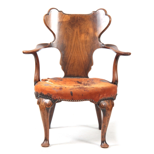 1156 - AN EARLY 20TH CENTURY WALNUT OPEN ARMCHAIR IN THE MANER OF GILLOWS with figured shaped back splat, s... 