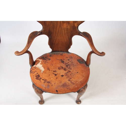 1156 - AN EARLY 20TH CENTURY WALNUT OPEN ARMCHAIR IN THE MANER OF GILLOWS with figured shaped back splat, s... 