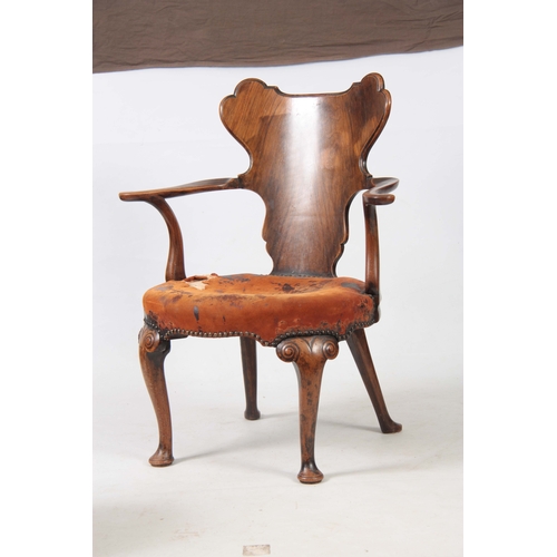 1156 - AN EARLY 20TH CENTURY WALNUT OPEN ARMCHAIR IN THE MANER OF GILLOWS with figured shaped back splat, s... 