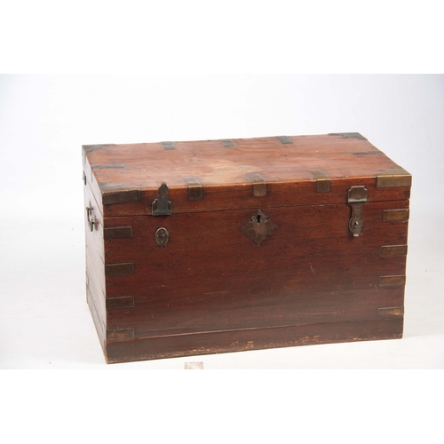 1158 - A 19TH CENTURY COLONIAL ANGLO INDIAN TEAK OFFICERS TRUNK having brass mounted corners and double-loc... 