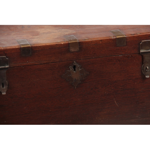 1158 - A 19TH CENTURY COLONIAL ANGLO INDIAN TEAK OFFICERS TRUNK having brass mounted corners and double-loc... 