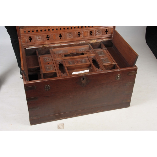 1158 - A 19TH CENTURY COLONIAL ANGLO INDIAN TEAK OFFICERS TRUNK having brass mounted corners and double-loc... 