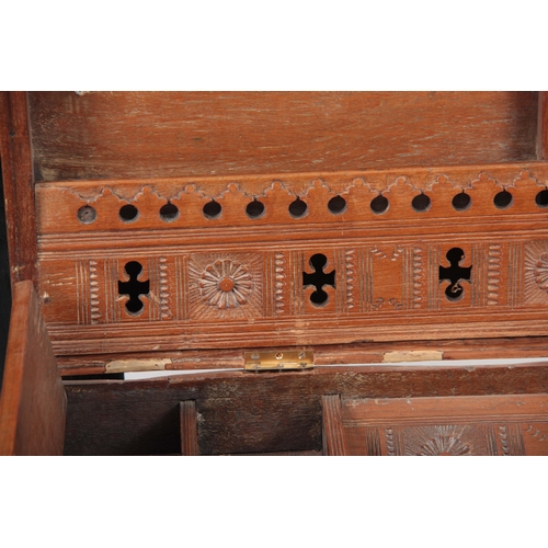 1158 - A 19TH CENTURY COLONIAL ANGLO INDIAN TEAK OFFICERS TRUNK having brass mounted corners and double-loc... 