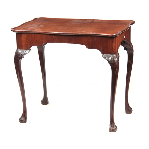 1161 - A GEORGE II MAHOGANY IRISH SILVER TABLE with shaped moulded edge top, with pull-out slides; standing... 