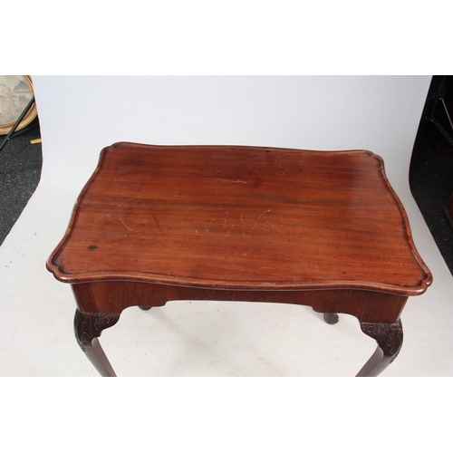 1161 - A GEORGE II MAHOGANY IRISH SILVER TABLE with shaped moulded edge top, with pull-out slides; standing... 