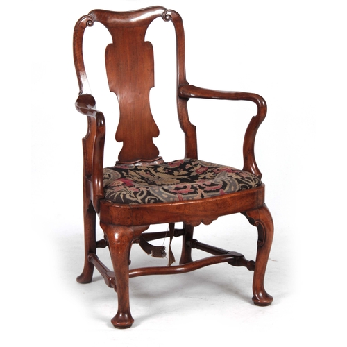 1163 - A GEORGE I WALNUT OPEN ARMCHAIR with scrolled top rail above a shaped back splat joined by shepherds... 