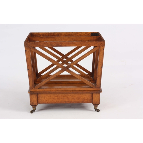 1176 - A STYLISH LATE 19TH CENTURY HONEY COLOURED OAK CANTERBURY with three X shaped book divides and ... 