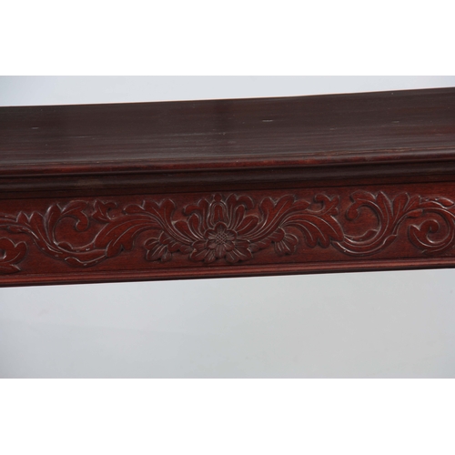 1179 - A REGENCY ANGLO-INDIAN ROSEWOOD CONSOL TABLE the moulded top with rounded corners above a frieze dra... 