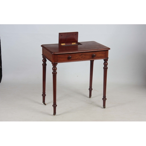 1185 - AN EARLY 19TH CENTURY MAHOGANY WRITING TABLE IN THE MANER OF GILLOWS having a lift-up pen and ink co... 