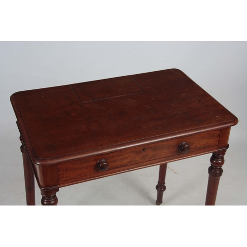 1185 - AN EARLY 19TH CENTURY MAHOGANY WRITING TABLE IN THE MANER OF GILLOWS having a lift-up pen and ink co... 