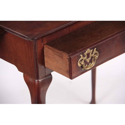 1186 - A GEORGE II FIGURED MAHOGANY SIDE TABLE with dished top, side candle slides, fitted frieze drawer wi... 