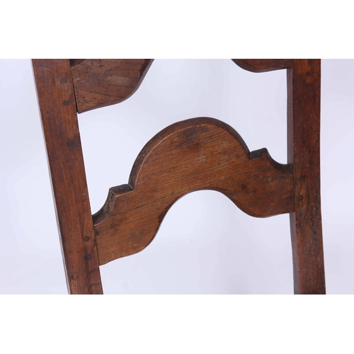 1188 - A LATE 18TH CENTURY JOINED OAK  SIDE CHAIR with arched splat back and  plank seat; standing on squar... 