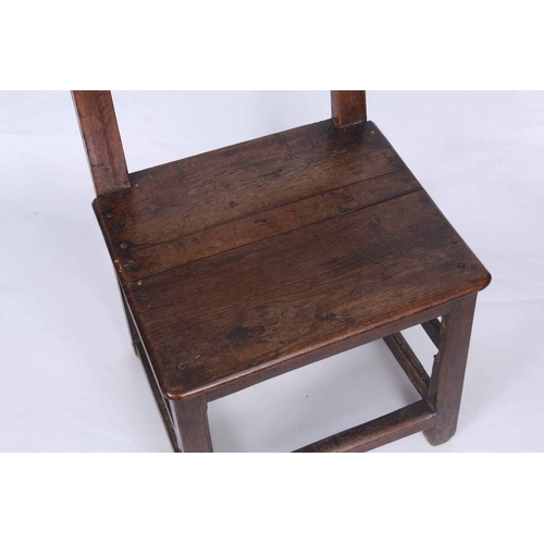 1188 - A LATE 18TH CENTURY JOINED OAK  SIDE CHAIR with arched splat back and  plank seat; standing on squar... 