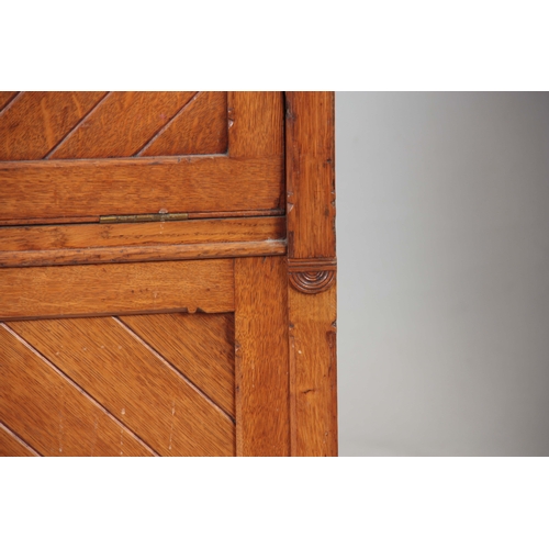 1192 - AN UNUSUAL LATE 19TH CENTURY OAK SECRETAIRE CHEST with a grooved panelled front fitted with aestheti... 