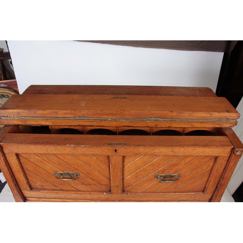 1192 - AN UNUSUAL LATE 19TH CENTURY OAK SECRETAIRE CHEST with a grooved panelled front fitted with aestheti... 