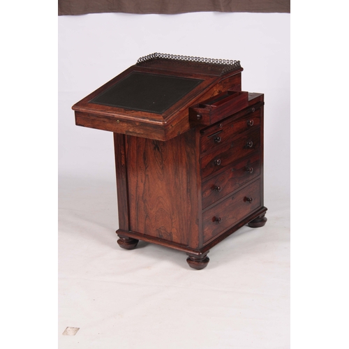 1203 - AN EARLY 19TH CENTURY ROSEWOOD DAVENPORT the top section with brass gallery and angled leather writi... 