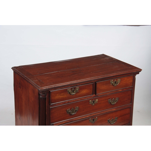 1205 - A GEORGE III MAHOGANY LANCASHIRE CHEST OF DRAWERS with quarter column sides flanking two small and t... 