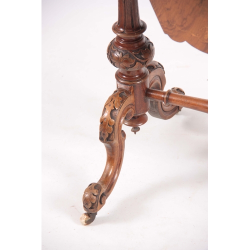 1209 - A VICTORIAN BURR WALNUT WORK / GAMES TABLE having hinged revolving top above a pull-out drawer and i... 