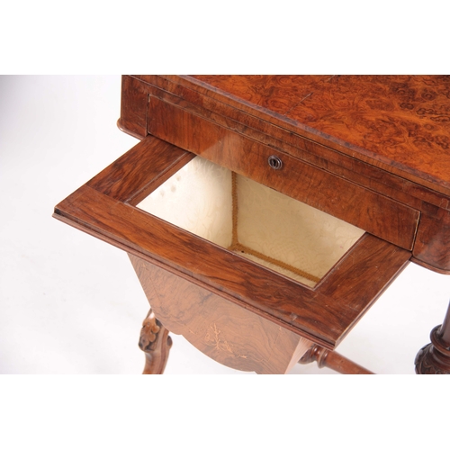 1209 - A VICTORIAN BURR WALNUT WORK / GAMES TABLE having hinged revolving top above a pull-out drawer and i... 