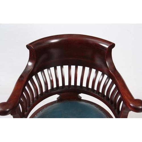 1210 - AN EARLY 20th CENTURY MAHOGANY CAPTAINS CHAIR with swivel action seat on cabriole legs and shaped cr... 